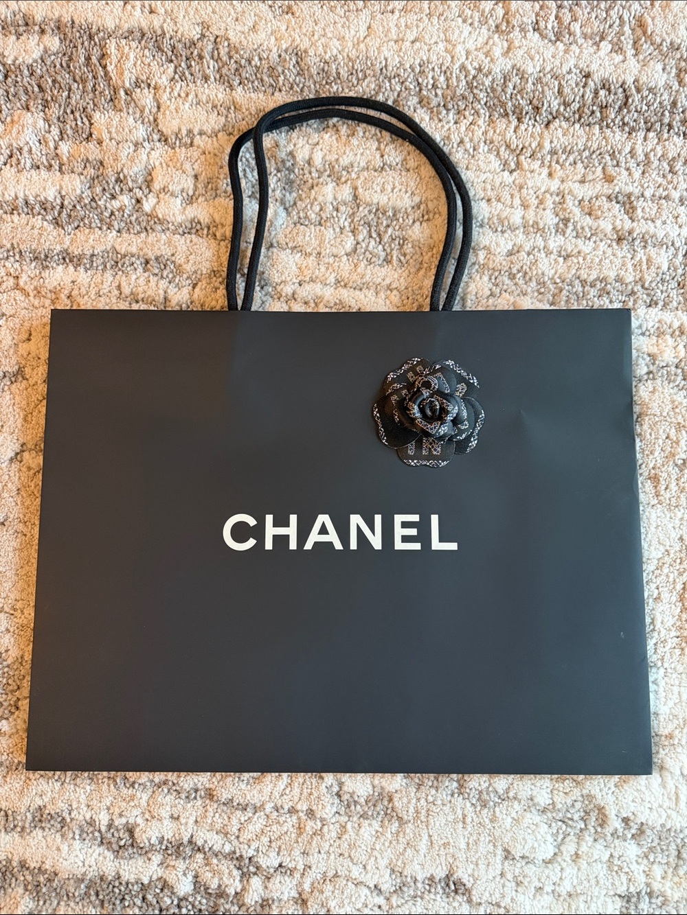 CHANEL Black and White Logo Shopping Bag with Camellia